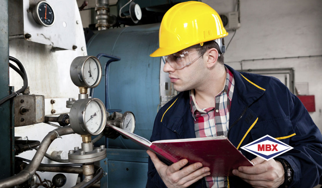 industrial boilers - engineer analyzing meters